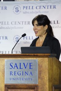 Daphne Matziaraki, a Greek documentary filmmaker, at the podium at Salve Regina University.